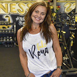 Woman in White T-Shirt with Fukc cursive Logo